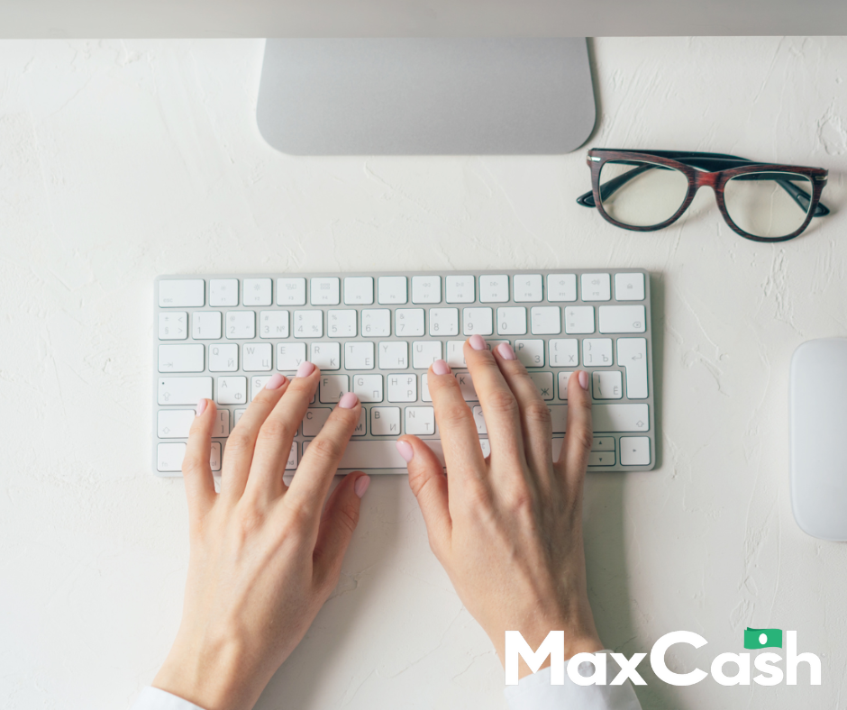 Person Typing on Keyboard