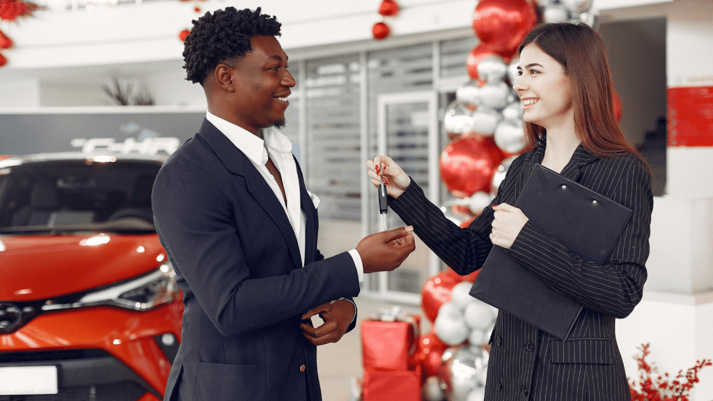 Exchanging keys after the purchase of a vehicle in a vehicle dealership