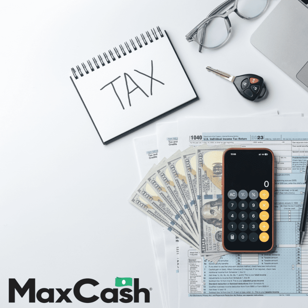 Tax notebook and calculator with money